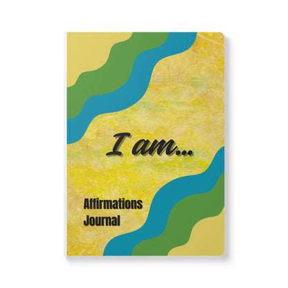 Journal with 'I am... Affirmations Journal' text on a yellow background with blue and green wavy patterns