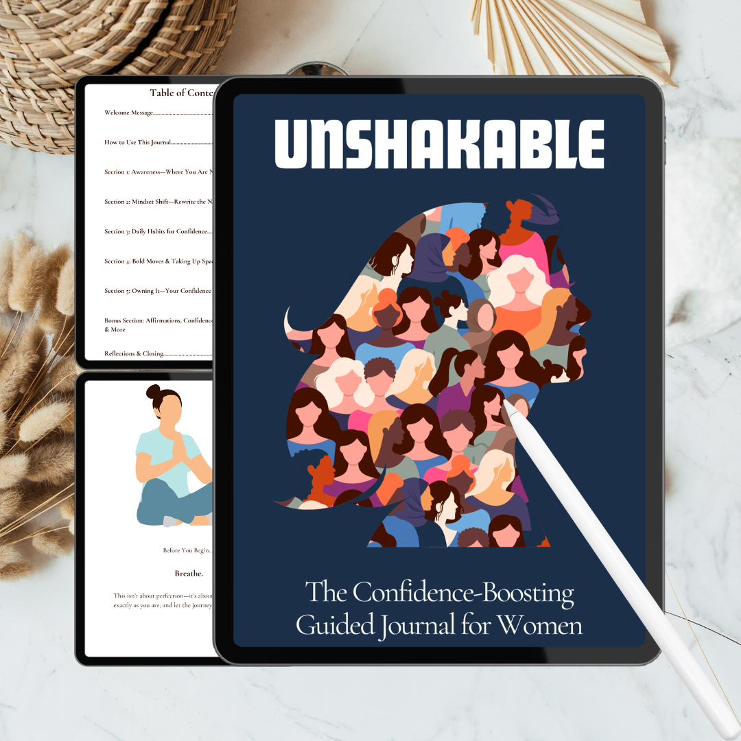Digital version of 'Unshakable' guided journal for women on a tablet with a pen and feather on a marble surface.